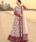 Red & white faux georgette readymade suit with embroidered tassels attached
