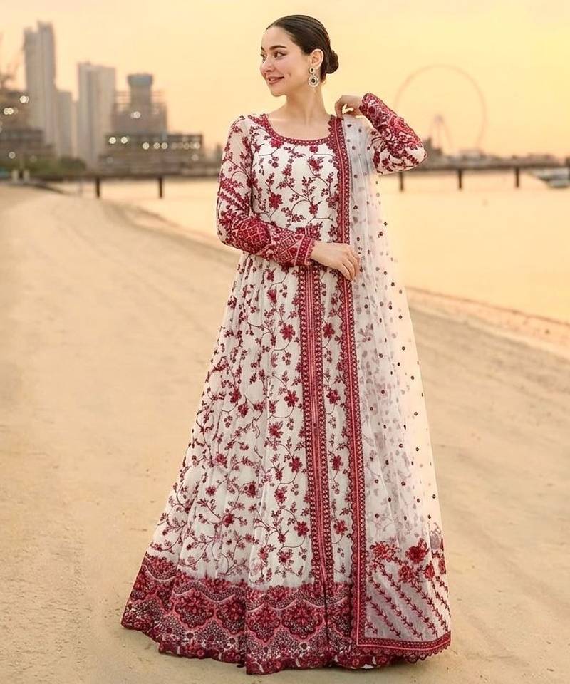 Red & white faux georgette readymade suit with embroidery & tassels attached