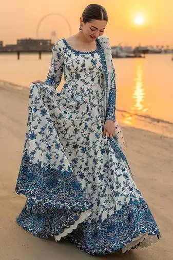Blue & white faux georgette readymade suit with embroidered tassels attached