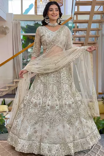 Gorgeous White Embroidered Net Party Wear Lehenga Choli With Dupatta
