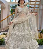 Gorgeous White Embroidered Net Party Wear Lehenga Choli With Dupatta