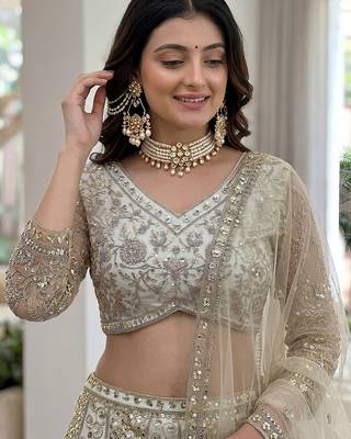 Gorgeous White Embroidered Net Party Wear Lehenga Choli With Dupatta 5