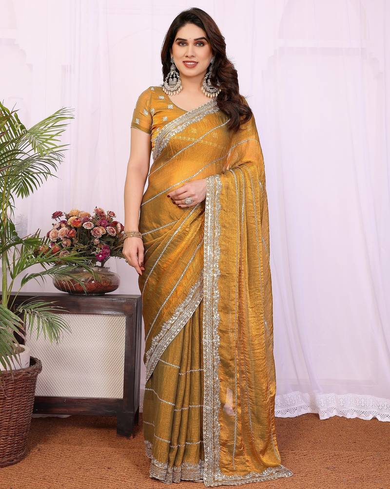 Gold chiffon sequence work saree with matching blouse piece