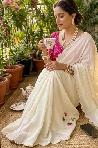 White Color Hand CutDana Bandhni And Butta Work art silk saree