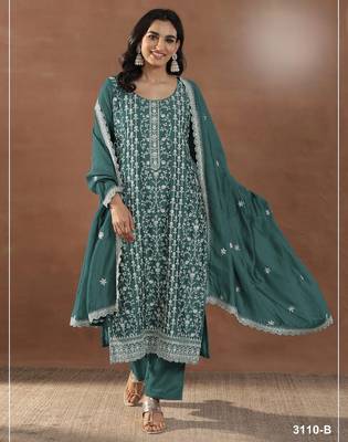 Emerald silk suit with embroidered sequin  1