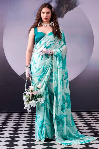 Firozi softness satin silk floral print with pearl lace border saree