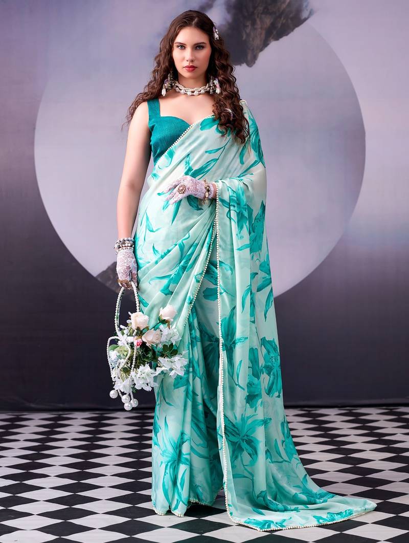 Firozi softness satin silk floral print with pearl lace border saree