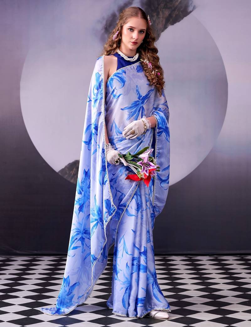 Sea blue softness satin silk floral print with pearl lace border saree