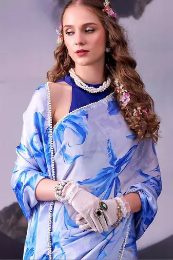 Sea blue softness satin silk floral print with pearl lace border saree