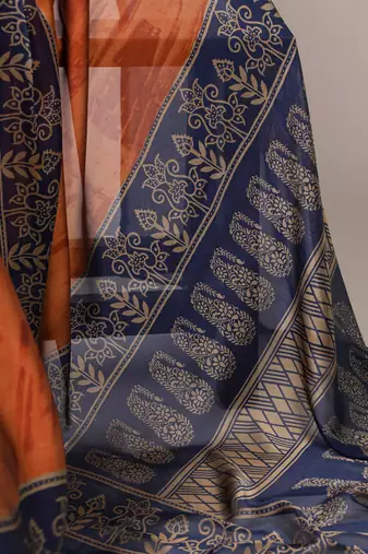 Rust orange classic rangoli silk printed saree