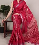 Cherry red slub silk foral printed with zari border work saree