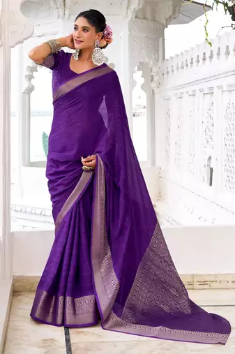 Purple self printed chinnon silk zari weaving work saree