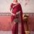 Maroon self printed chinnon silk zari weaving work saree