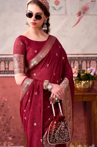 Maroon self printed chinnon silk zari weaving work saree