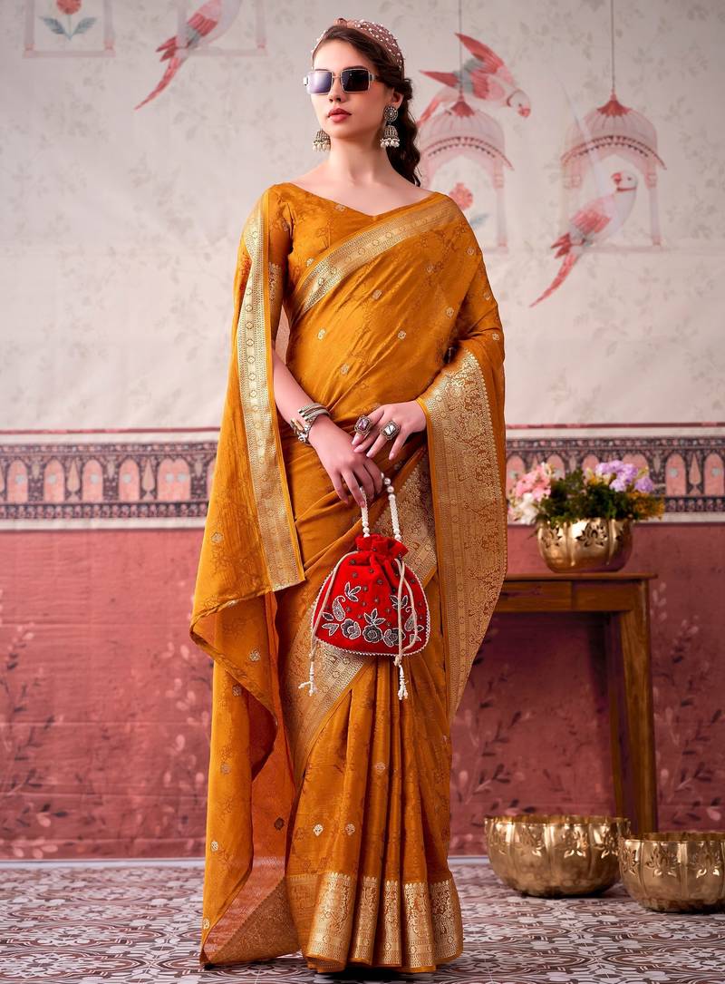 Mustard self printed chinnon silk zari weaving work saree