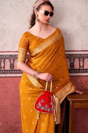 Mustard self printed chinnon silk zari weaving work saree