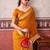 Mustard self printed chinnon silk zari weaving work saree
