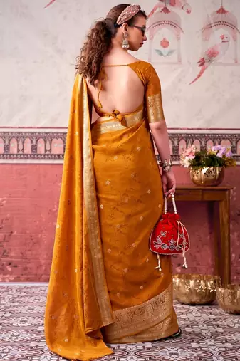 Mustard self printed chinnon silk zari weaving work saree