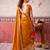 Mustard self printed chinnon silk zari weaving work saree