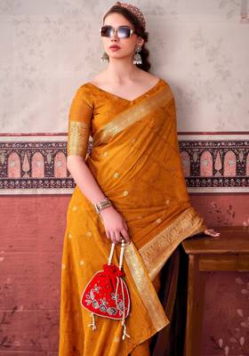 Mustard self printed chinnon silk zari weaving work saree 5