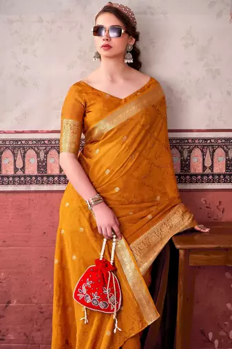 Mustard self printed chinnon silk zari weaving work saree