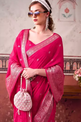 Pink self printed chinnon silk zari weaving work saree