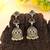 Green color american diamond earrings