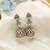 Pista green color american diamond earrings