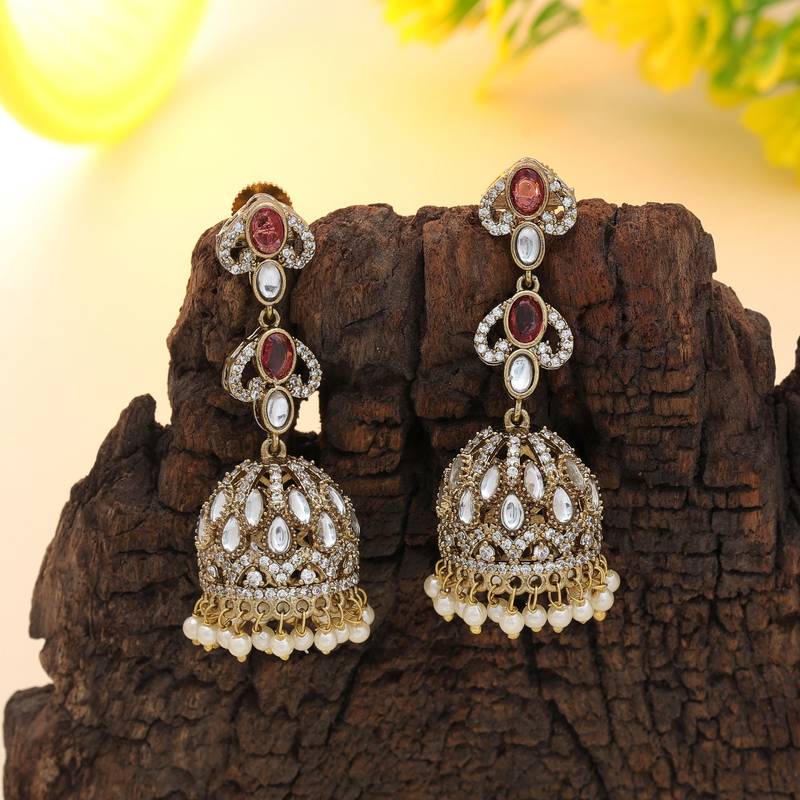 Magenta color american diamond earrings
