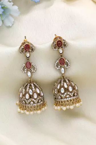 Magenta color american diamond earrings