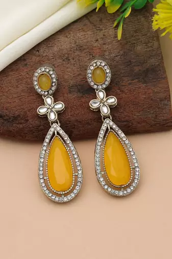 Yellow color kundan earrings