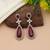 Maroon color kundan earrings