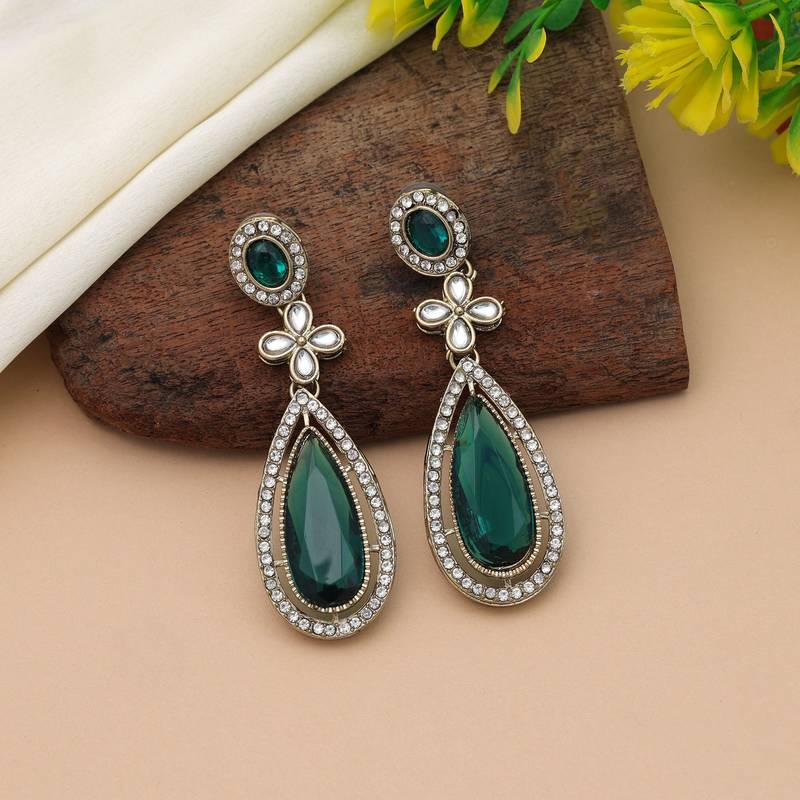 Green color kundan earrings