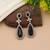 Black color kundan earrings