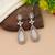 White color kundan earrings