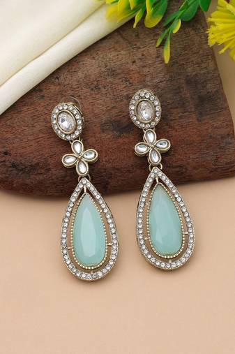Pista green color kundan earrings