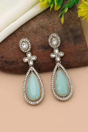 Pista green color kundan earrings