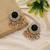 Black color kundan earrings