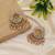 Gold color kundan earrings