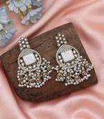 White color kundan earrings