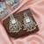 White color kundan earrings