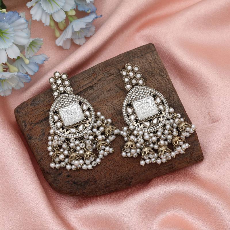 White color kundan earrings