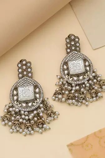 White color kundan earrings