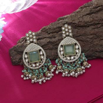 Pista green color kundan earrings 1