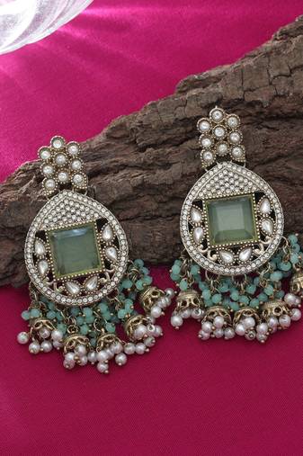 Pista green color kundan earrings