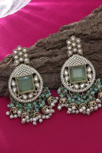 Pista green color kundan earrings