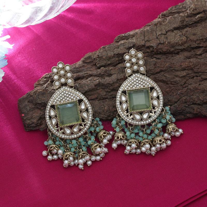 Pista green color kundan earrings