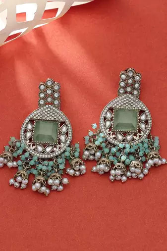 Pista green color kundan earrings