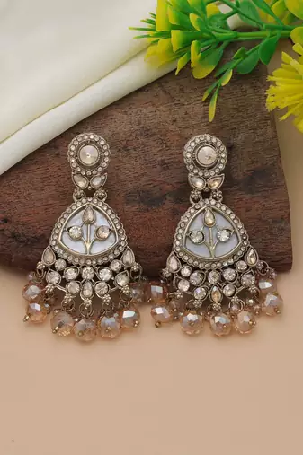 Gold color kundan earrings