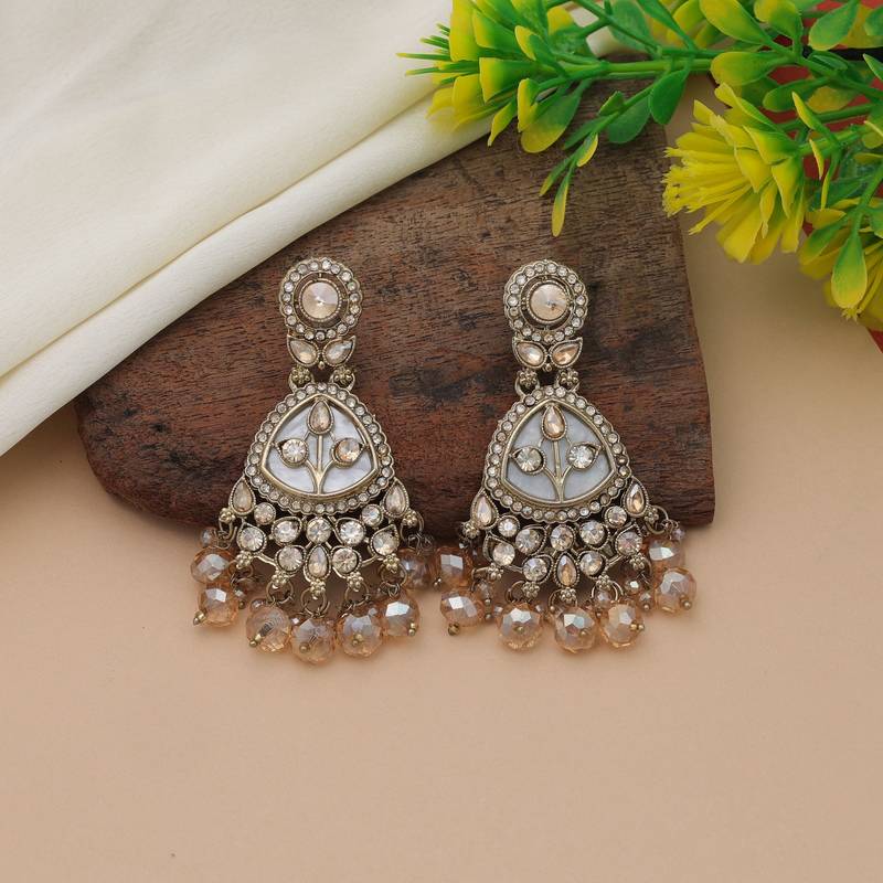 Gold color kundan earrings